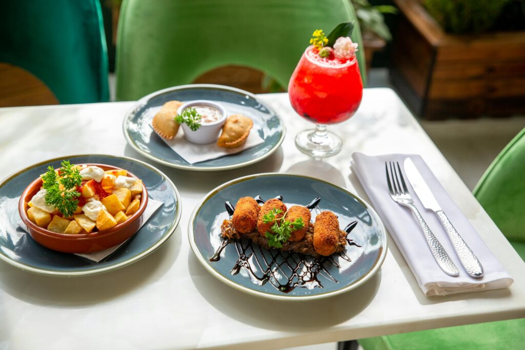 Variety of Cooked Food on Ceramic Plates